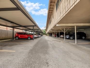 Assigned covered parking with storage area.