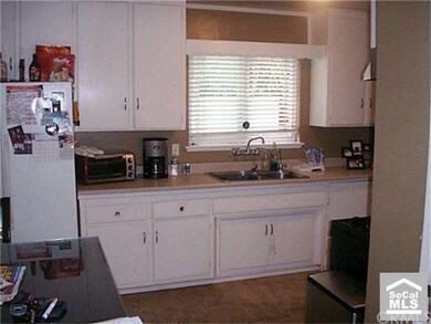 Darling kitchen has enough room for a small dining table or you can use your imagine to expand an already functional kitchen.