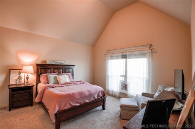 first master bedroom at front of home. vaulted cei