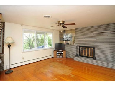 Living Room. Fireplace - Hard Wood Flooring