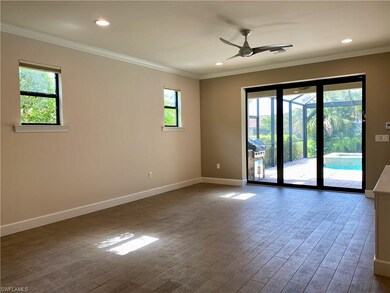 Living area open to pool and spa