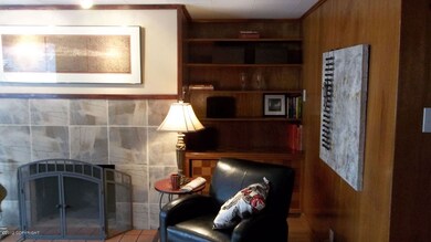 Mahogony Paneling Highlights this Home
