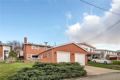 HUGE attached two car garage with additional off-s