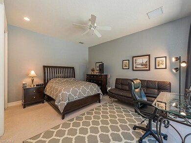 Guest bedroom (4th bedroom) with sliding glass doo