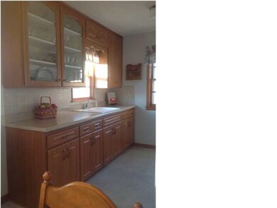 Kitchen. New vinyl floor, counter tops, back splas