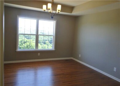 Formal Dining room with hardwood flooring