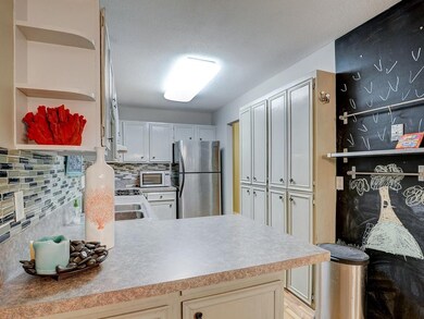 Enjoy lots of storage and a breakfast bar counter 