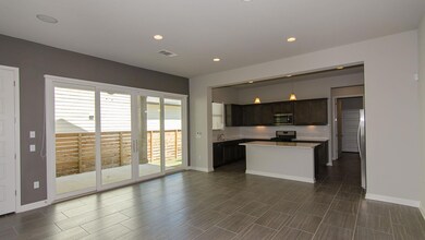 Kitchen with stainless steel appliances, light co