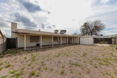 Large backyard with RV gate