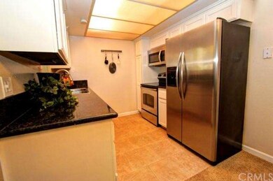 View of renovated and charming galley kitchen with