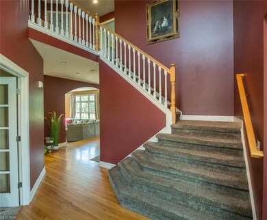 Two story foyer with conveniently located front office complete with French doors.  Newer carpeting throughout the home.