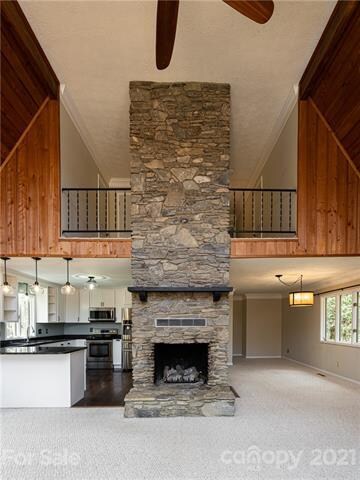 2-story great room with stone fireplace
