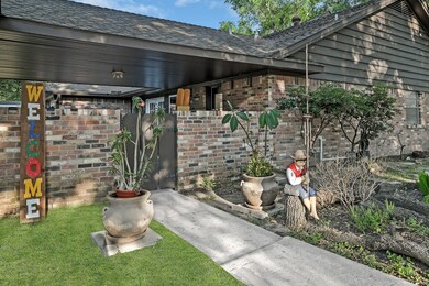 This Side yard entrance is off the garage.