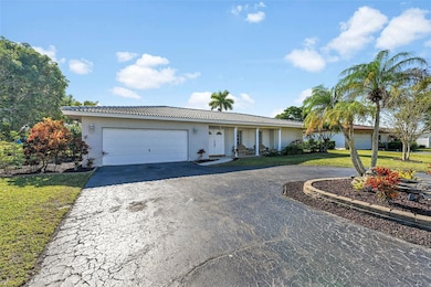 8579 NW 27th Dr, Coral Springs, FL 33065 - photo 2