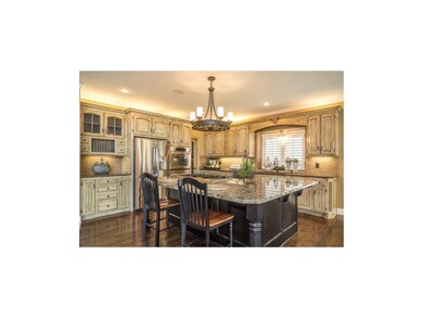 Designer's Dream w/Exotic Granite Island, SS Appli