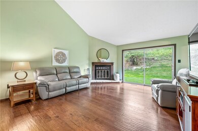 The living room includes a gas fireplace.