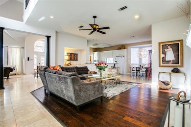 VIEW INTO LIVING, KITCHEN, AND FORMAL LIVING