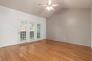 Empty room featuring light hardwood / wood-style f