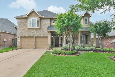 Updated landscaping provides wonderful curb appeal!