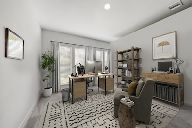 Flex room off the living room can be used as a den