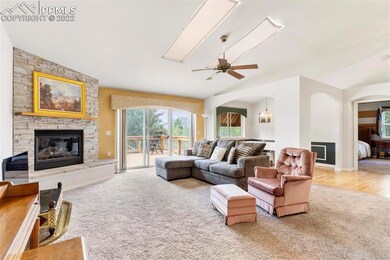 Living room's focal point is a Gas Fireplace with 