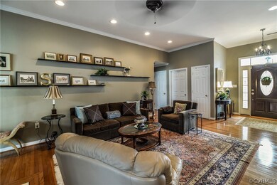 View of front Foyer with Chandelier
