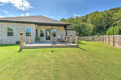 Backyard boasts addition of concrete patio and deck. Homeowners have even started a garden for the new buyer.