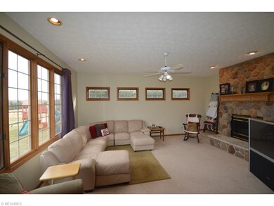 Family/ Great Room with double-sided fireplace.