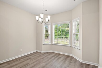 Empty room featuring hardwood / wood-style floors 