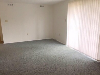 living room with sliding door to patio