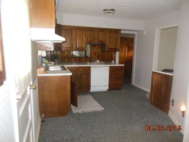 kitchen view to north with bar counter open to bre