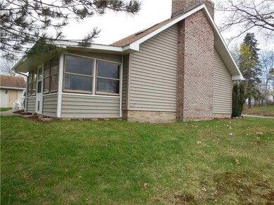 View. Screened Porch and Side View of Home