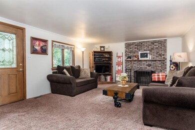 Large Family Room with a log burning fireplace
