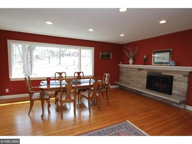 Large formal dining room with hardwood floor and h