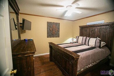 This is the second bedroom on the left going down 