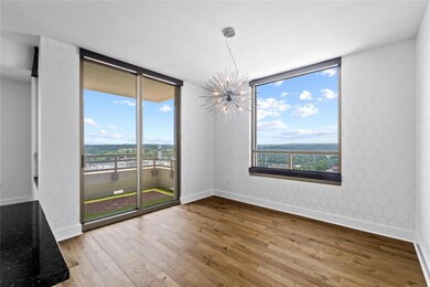 Spare room with hardwood / wood-style floors, a c