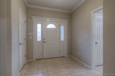 Spacious entryway with 2 storage closets