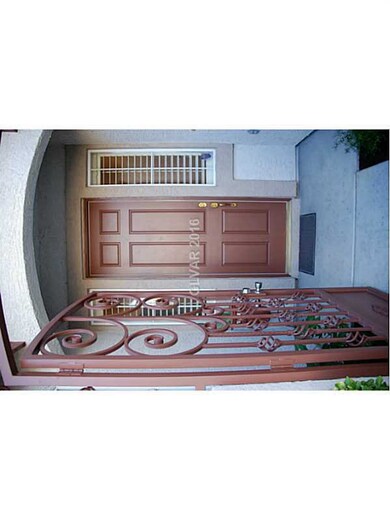 Property Photo. Front entry with security door.