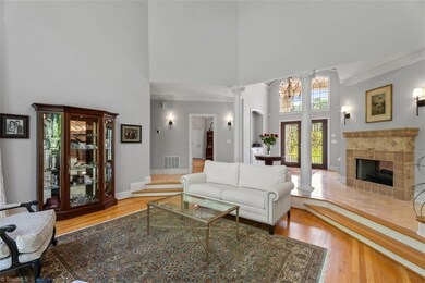 Double-sided fireplace shared by the great room and dining room