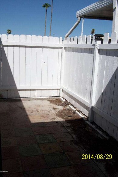 other side of wood fenced patio