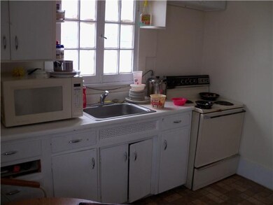 Exterior Front Kitchen in Upper Unit