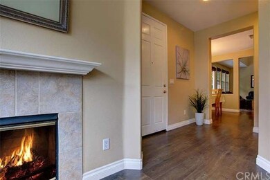 Formal entry with new laminate flooring. Den/Livin