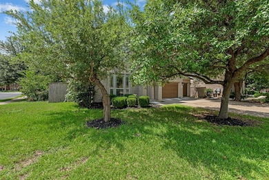 View of property hidden behind natural elements f