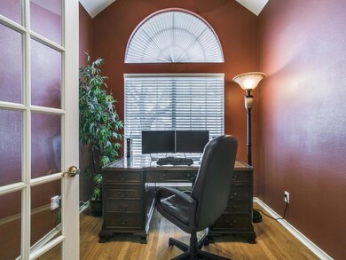 Separate study with glass French doors and laminat