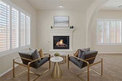 Living area with arched walkways, plenty of natura