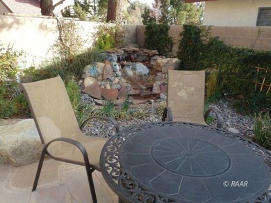 Front patio has a rock waterfall