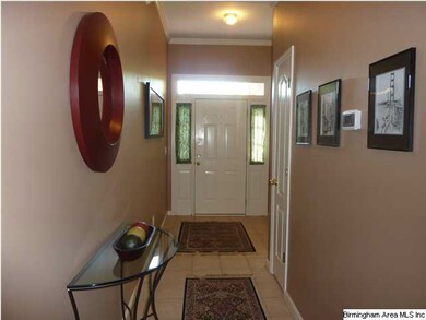 Foyer with tile flooring