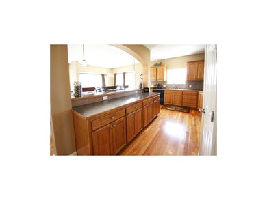 HUGE Kitchen Island with Eat-Up Counter and Cabine