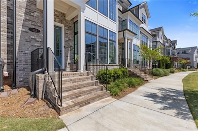 wide sidewalks with personal parking in front of unit