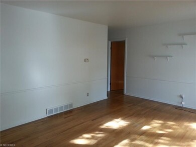 Another view of the living room. Floor is just Bea